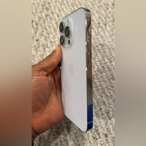 Apple Smartphone with Glossy White and Metallic Silver Design